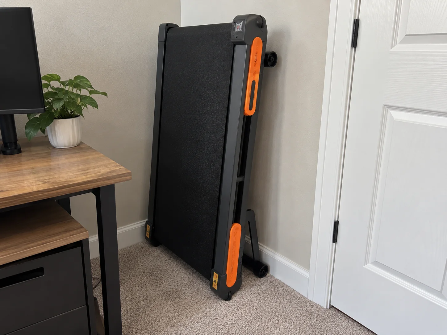 VITALWALK Apollo 11 Vibe-style walking pad stored upright